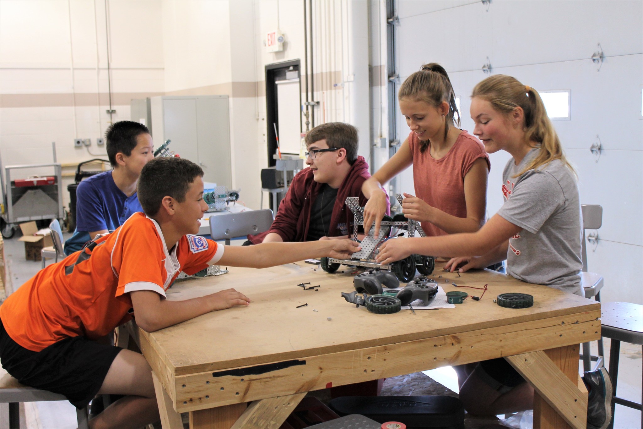 Camp students building robot